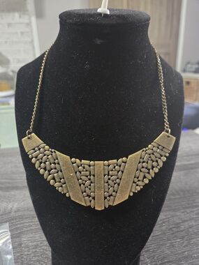 #156 paparazzi Antique Gold-Tone Textured Bib Necklace